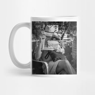 At an old steamboat a man traveling to the Swedish capital Stockholm Mug